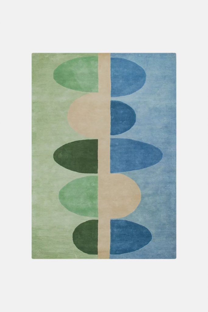neutral green rug and blue with geometric shapes 