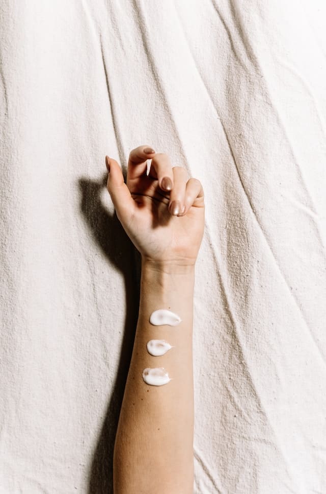 image of arm with lotion swatches