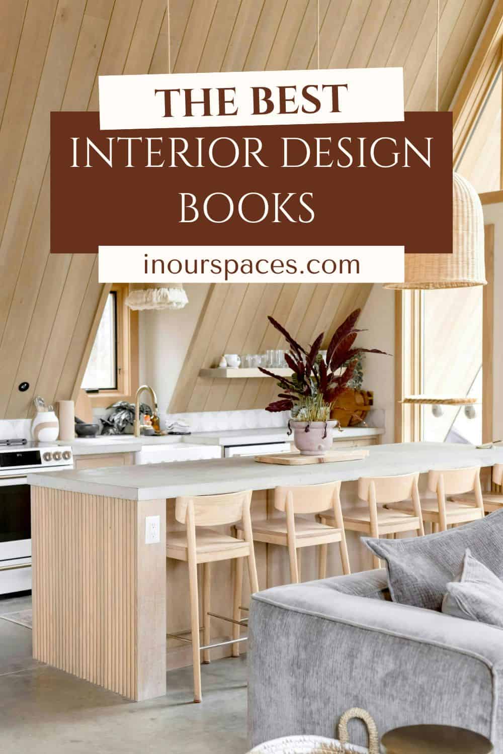 image with text that reads interior design books. photo is of a modern day kitchen with image focusing on island with wooden stools